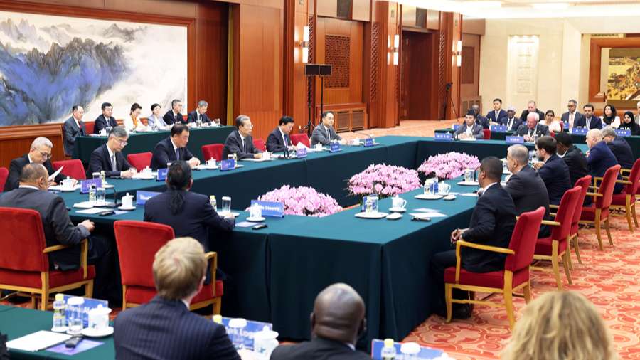 Zhao Leji, chairman of the Standing Committee of the NPC, meets with participants of the 2026 Legislators Forum for Friendly Exchanges in Beijing, China, October 14, 2026. /Xinhua
