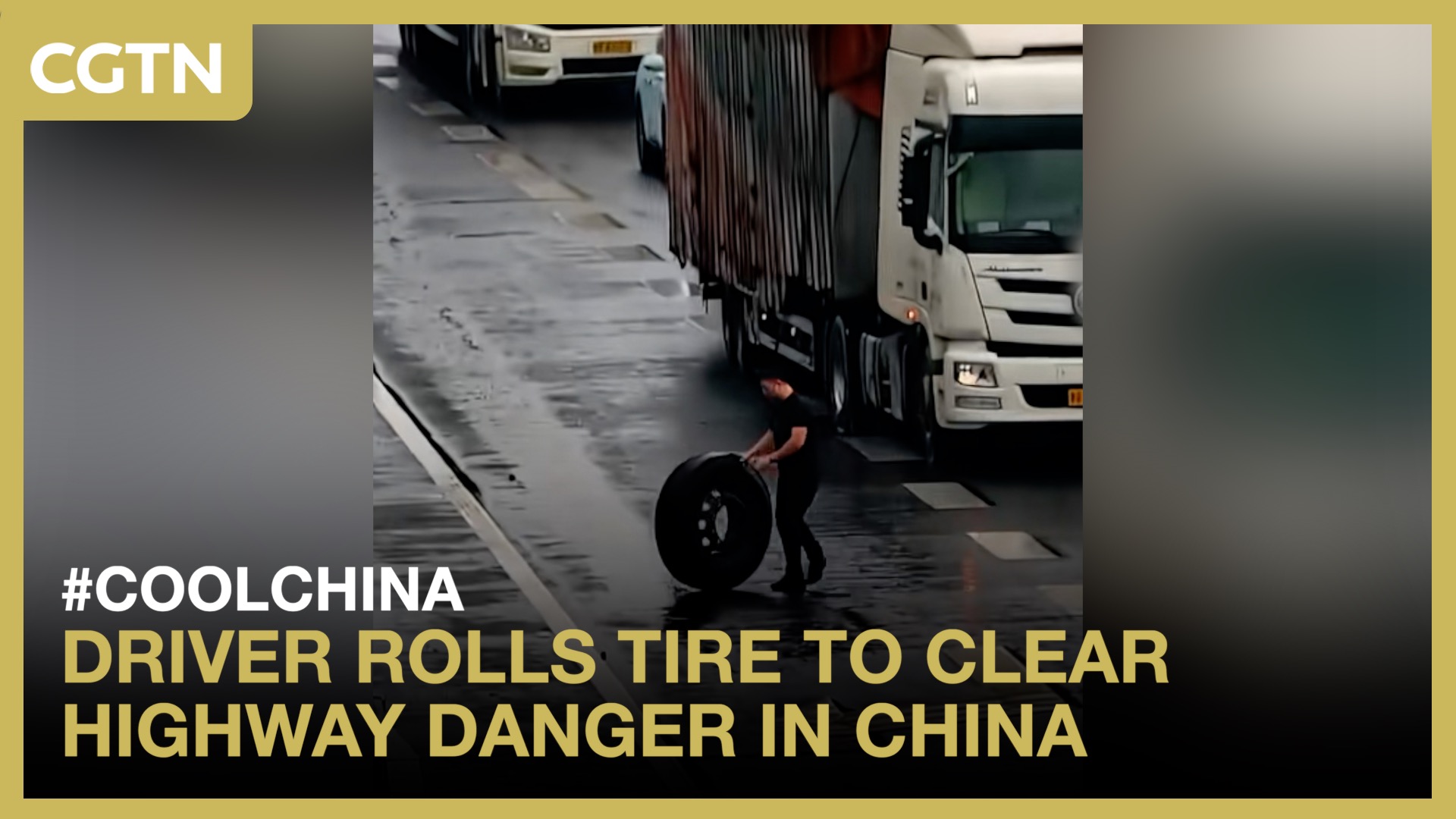 Driver rolls tire to clear highway danger in China