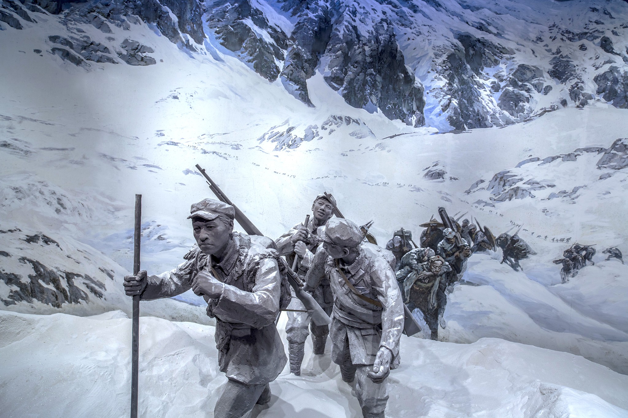A work of art depicting a scene of the Red Army crossing snowy terrain during the Long March. /CFP