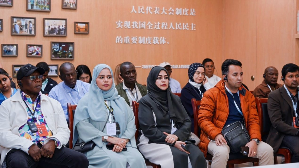 Legislators visit the Xiaobailou Grassroots Legislative Contact Point, listening to local staff explain how grassroots voices are fed into China’s national lawmaking process, Tianjin Municipality, China, October 12, 2026. 
