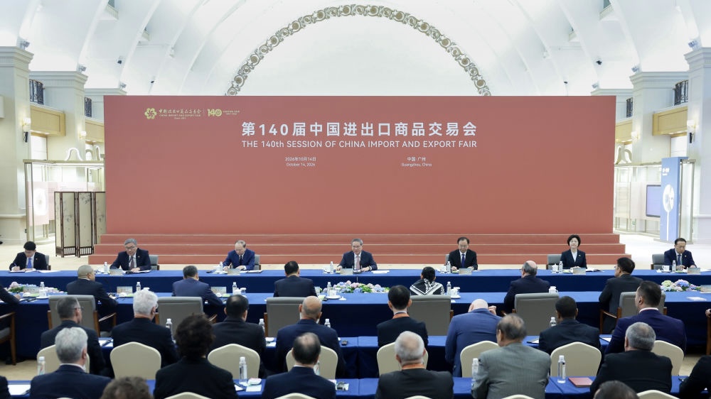 Chinese Premier Li Qiang attends a symposium with representatives of overseas buyers and exhibitors at the Canton Fair in Guangzhou, Guangdong Province, south China, October 14, 2026. /Xinhua 