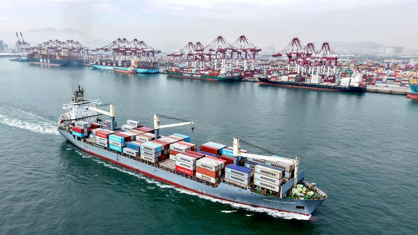 A cargo ship with containers leaves Qingdao Port in Shandong Province in east China, April 14, 2026. /Xinhua