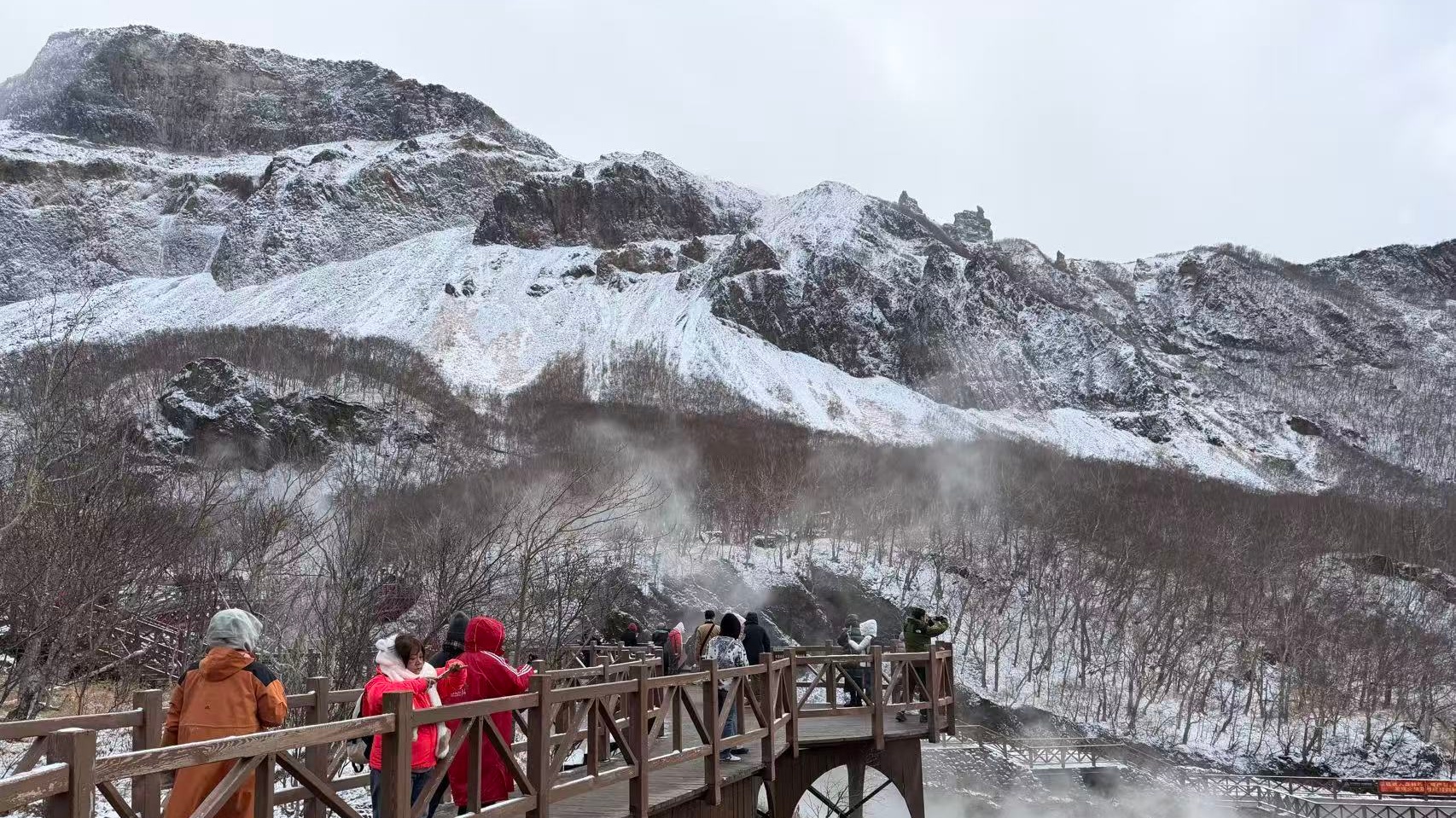 Tourists take photos of Changbai Mountain in Jilin Province, China, October 14, 2026. /CGTN