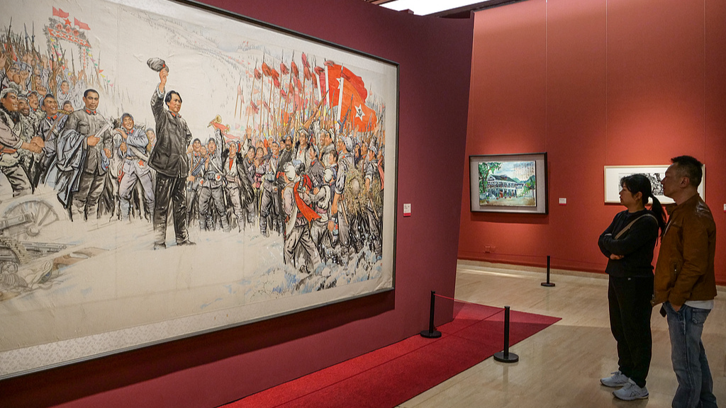 Visitors view an art exhibition commemorating the 90th anniversary of the victory of the Long March at the National Art Museum of China, October 15, 2026. /VCG