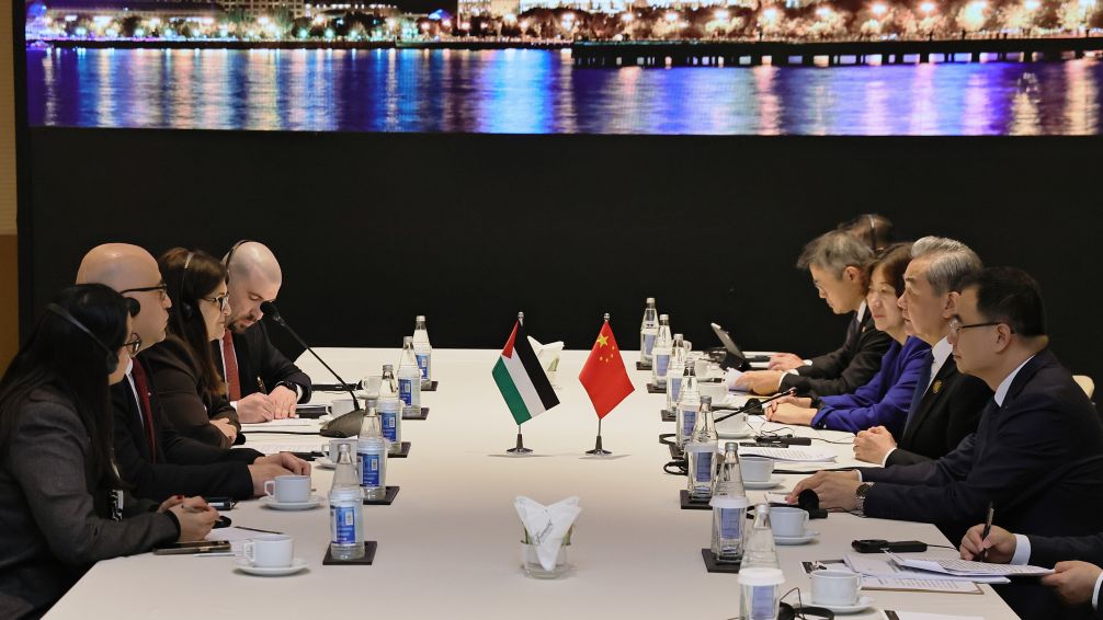 Chinese Foreign Minister Wang Yi, also a member of the Political Bureau of the Communist Party of China Central Committee, meets with Palestinian Foreign Minister Varsen Aghabekian Shahin on the sidelines of the Seventh Summit of the Conference on Interaction and Confidence Building Measures in Asia in Baku, Azerbaijan, October 15, 2026. /Xinhua