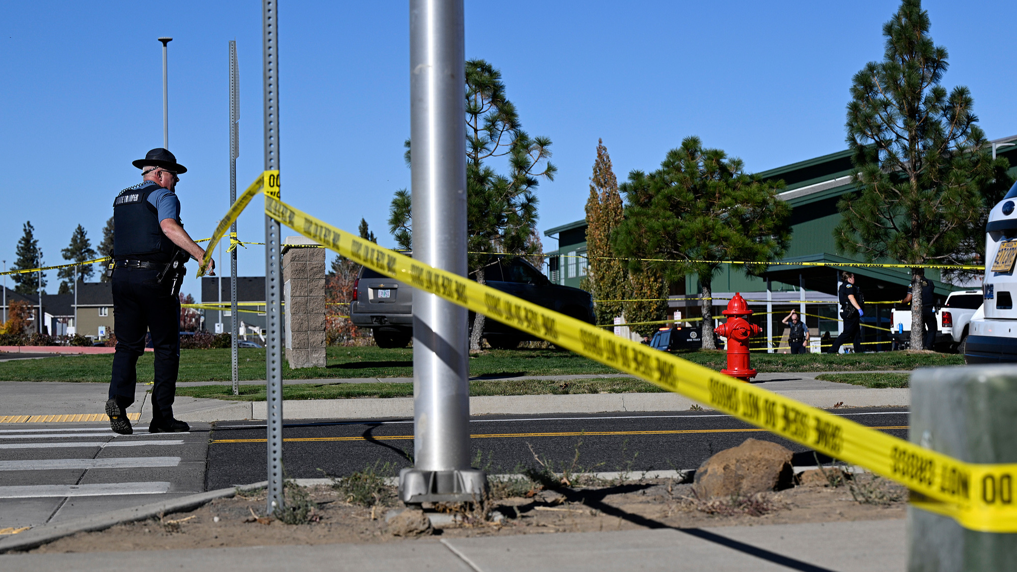 Police tape is placed outside Silver Rail Elementary School, where a shooting took place, in Bend, Oregon, US, October 15, 2026. /VCG