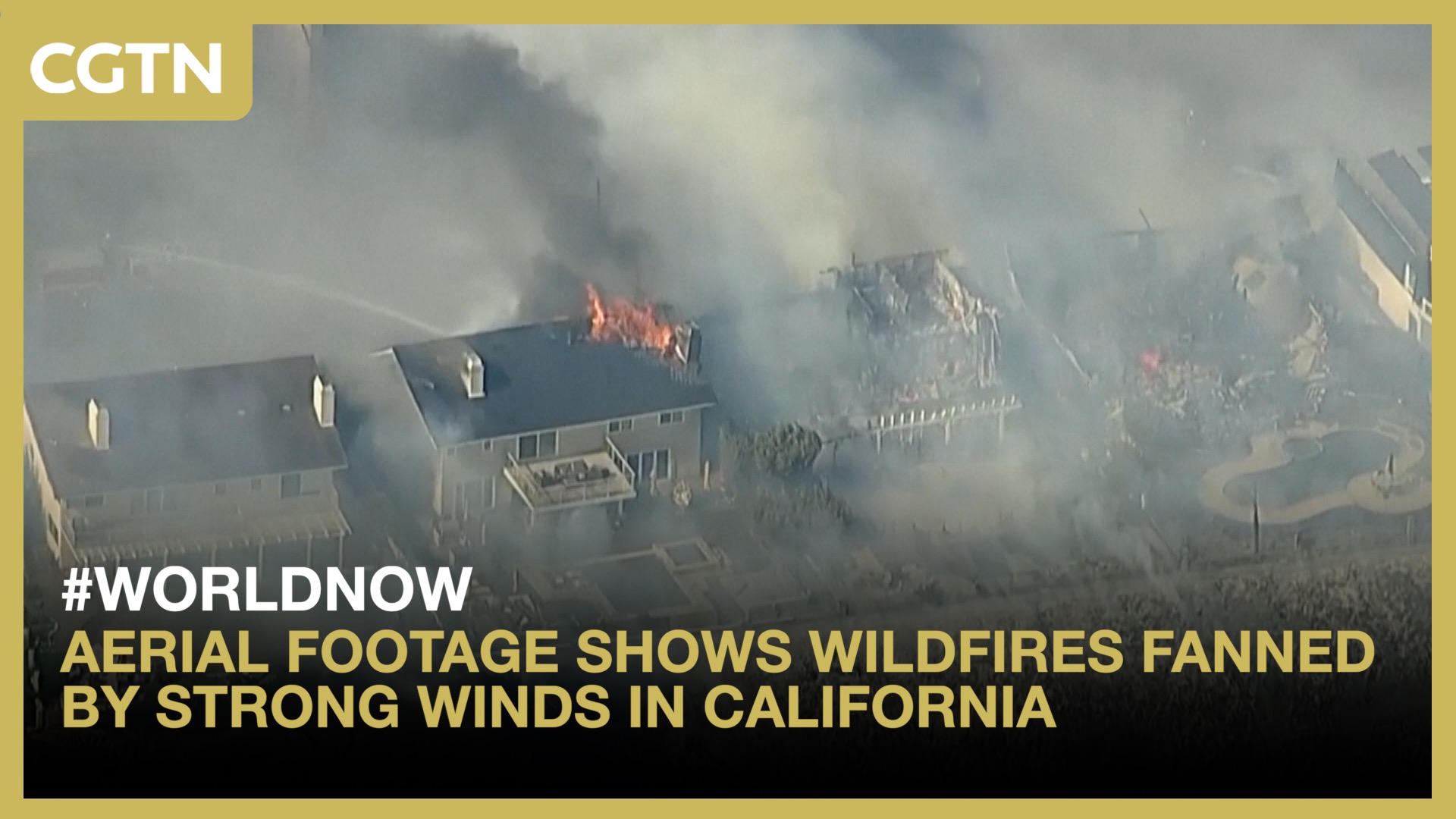 Aerial footage shows wildfires fanned by strong winds in California