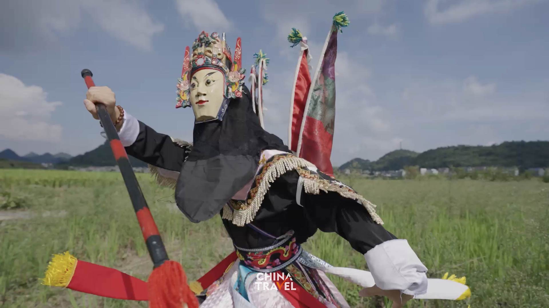 In Anshun, Guizhou, Dixi performers wear distinctive masks and use powerful movements to portray stories of loyalty, courage and perseverance. /CGTN