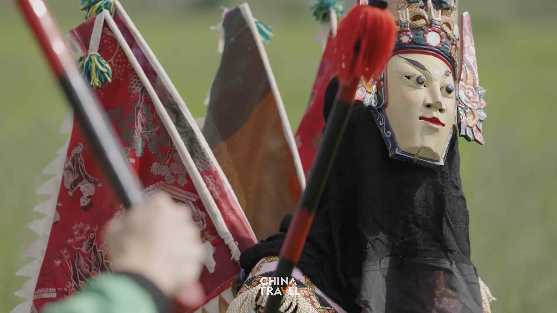 In Anshun, Guizhou, Dixi performers wear distinctive masks and use powerful movements to portray stories of loyalty, courage and perseverance. /CGTN