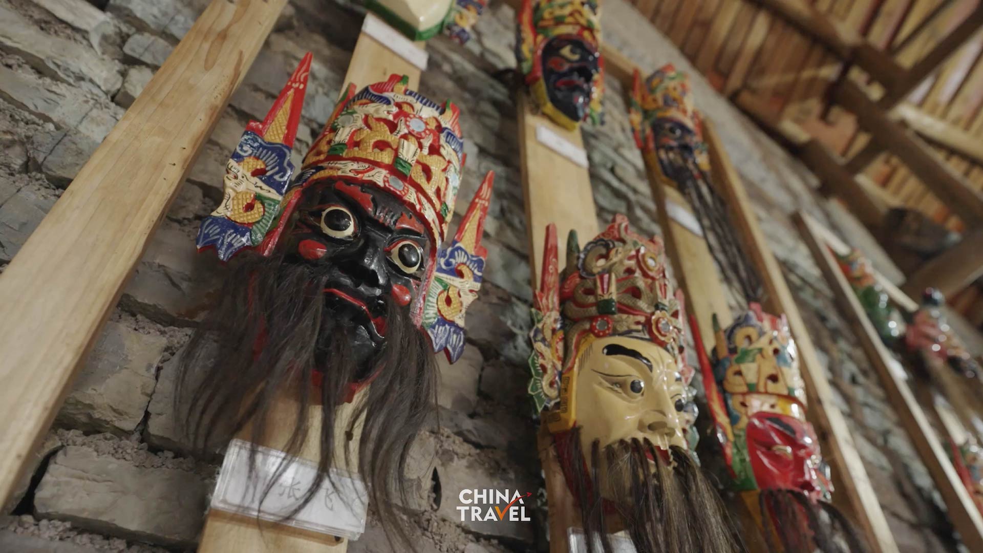 In Anshun, Guizhou, Dixi performers wear distinctive masks and use powerful movements to portray stories of loyalty, courage and perseverance. /CGTN