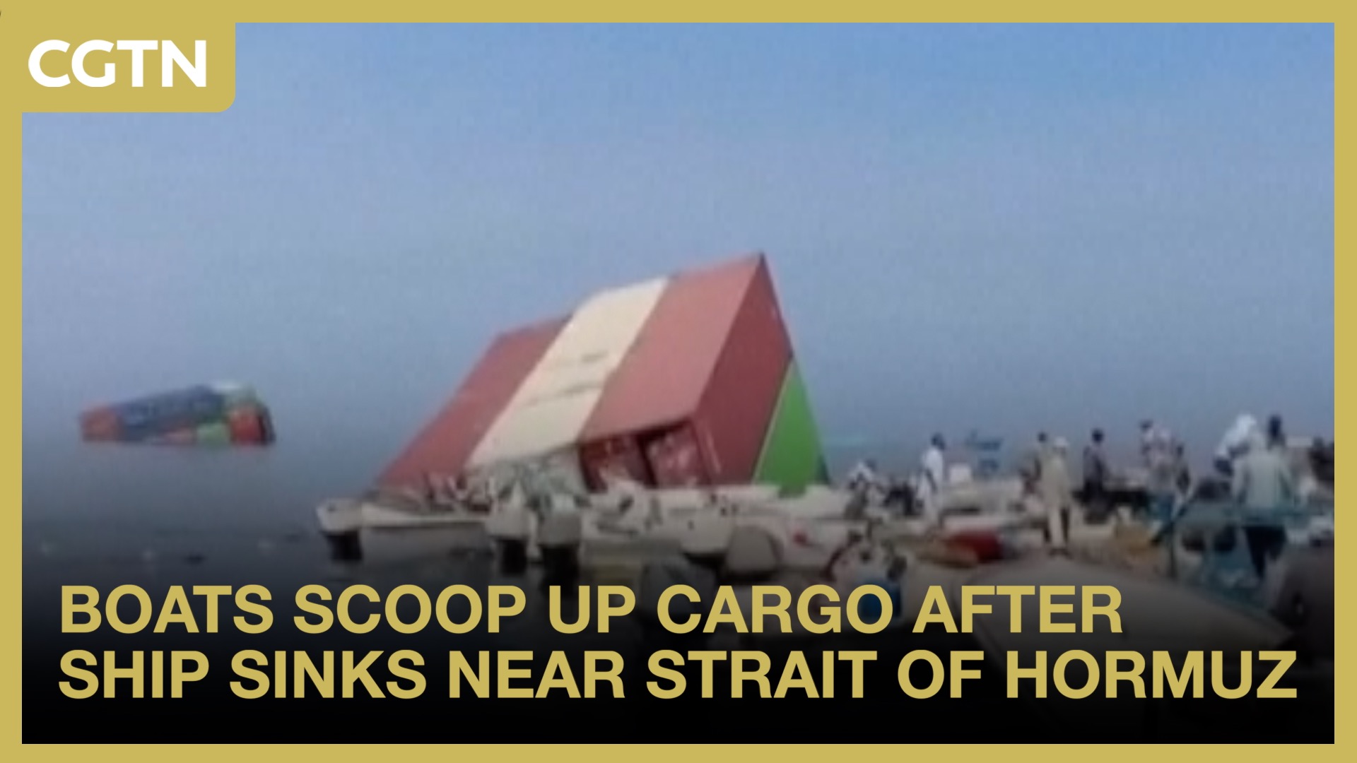 Boats scoop up cargo after ship sinks near Strait of Hormuz