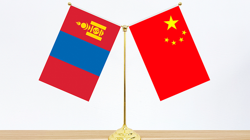 National flags of Mongolia and China. /CFP