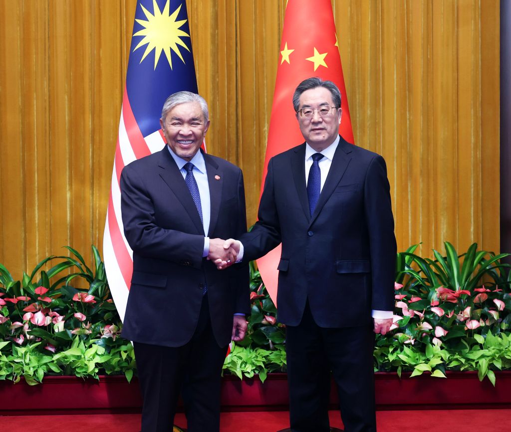 Chinese Vice Premier Ding Xuexiang meets with Ahmad Zahid Hamidi, deputy prime minister of Malaysia, Beijing, capital of China, October 15, 2026. /Xinhua