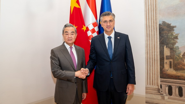 Croatian Prime Minister Andrej Plenkovic (R) shakes hands with Chinese Foreign Minister Wang Yi, also a member of the Political Bureau of the Communist Party of China Central Committee in Zagreb, Croatia, October 17, 2026. /Chinese Foreign Ministry