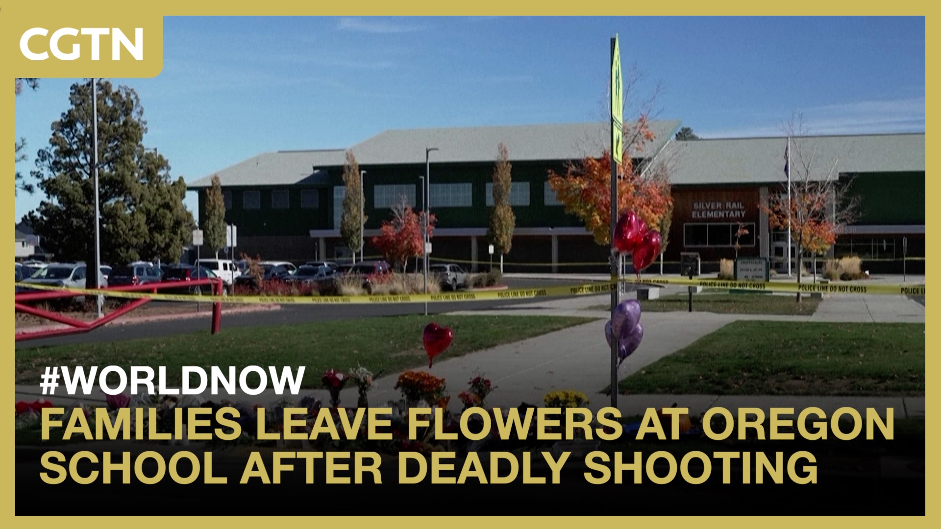 Families leave flowers at Oregon school after deadly shooting