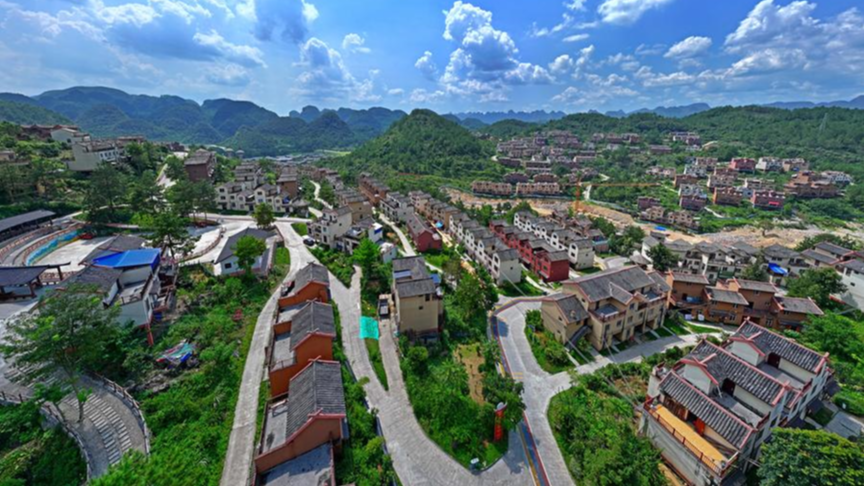 An aerial photo shows a poverty-relief relocation site for the Baiku Yao People in Nandan County, south China's Guangxi Zhuang Autonomous Region, August 28, 2024. /Xinhua
