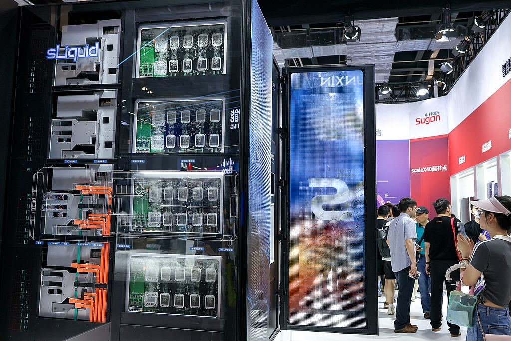 Visitors observe China's homegrown 100,000-card artificial intelligence (AI) supercluster at the WAIC 2026 in Shanghai, China, July 19, 2026. /VCG