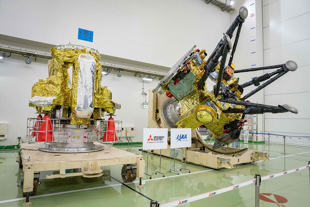 A Propulsion Module (L) and Exploration and Return Modules (R), making up the Martian Moons eXploration (MMX) spacecraft, are seen at the Tanegashima Space Center in Minamitane, Kagoshima prefecture on August 13, 2026. /VCG