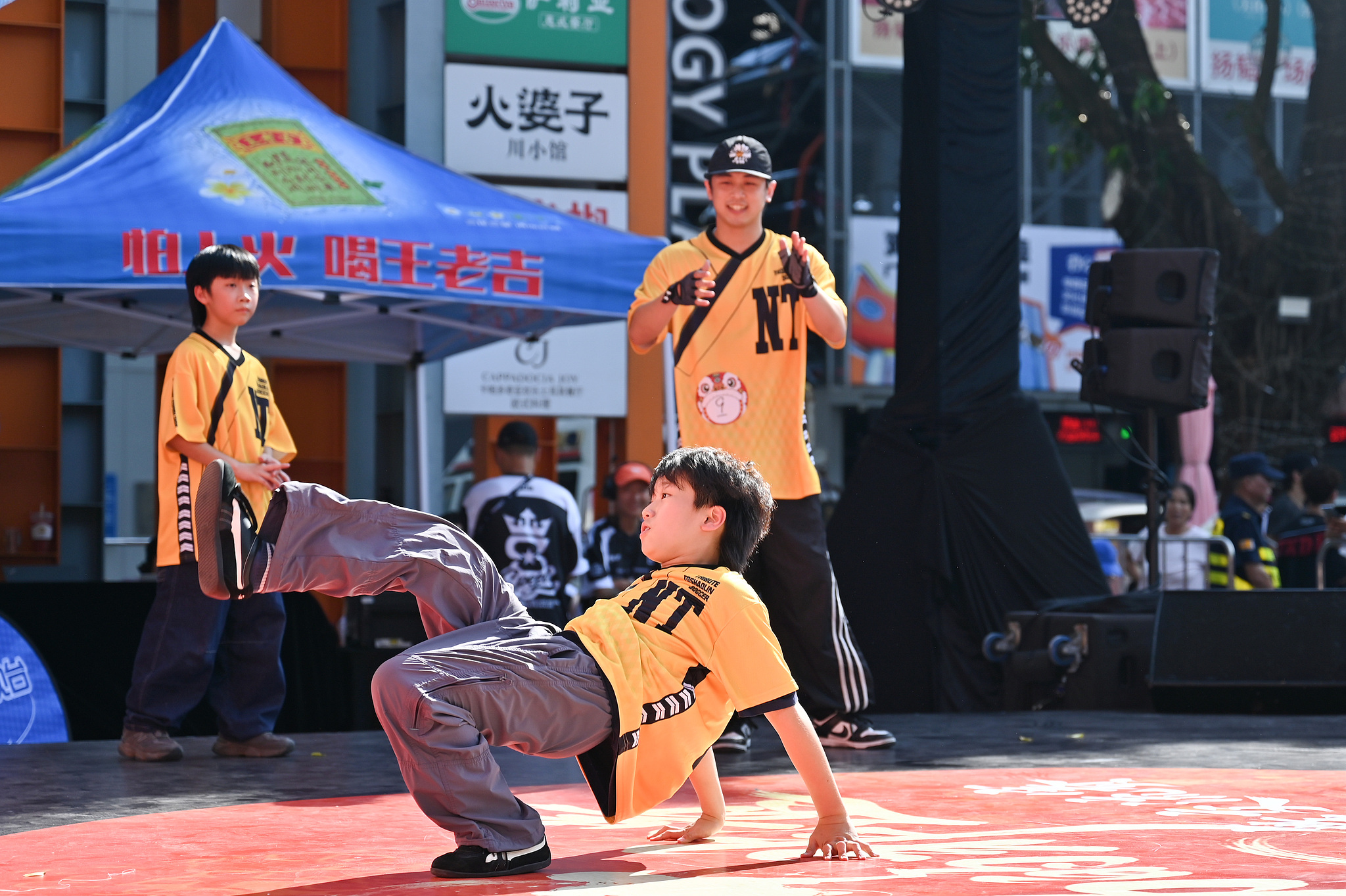 A young dancer performs during the fourth 