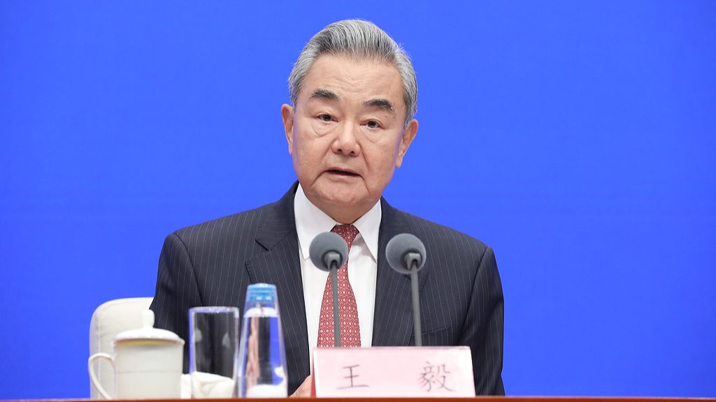 Wang Yi, a member of the Political Bureau of the Communist Party of China Central Committee and Minister of Foreign Affairs, attends a press conference held by the State Council Information Office, Beijing, capital of China, June 17, 2026. /VCG