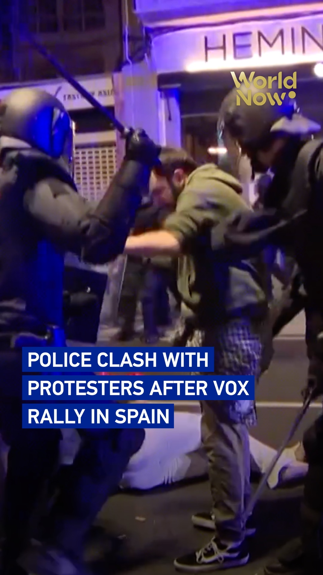 Police clash with protesters after Vox rally in Spain