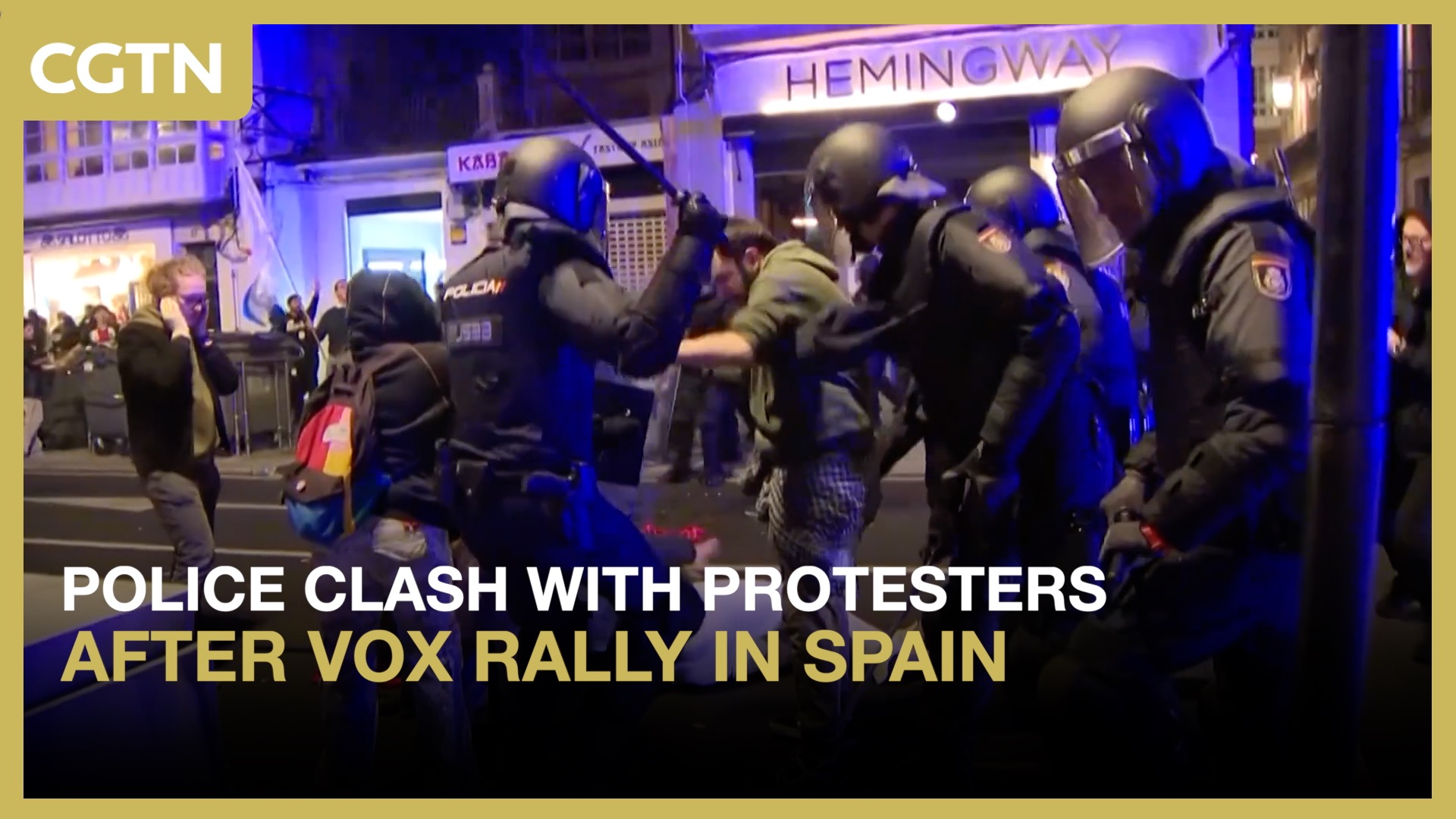 Police clash with protesters after Vox rally in Spain