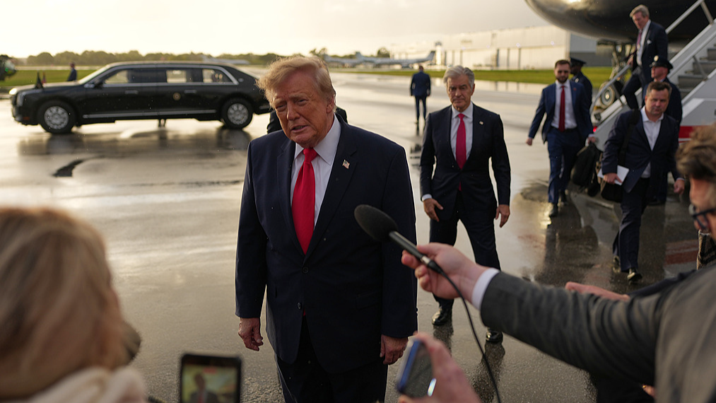 US President Donald Trump talks to reporters after arriving on Air Force One at President Donald J. Trump International Airport in West Palm Beach, Florida, US, October 23, 2026. /VCG