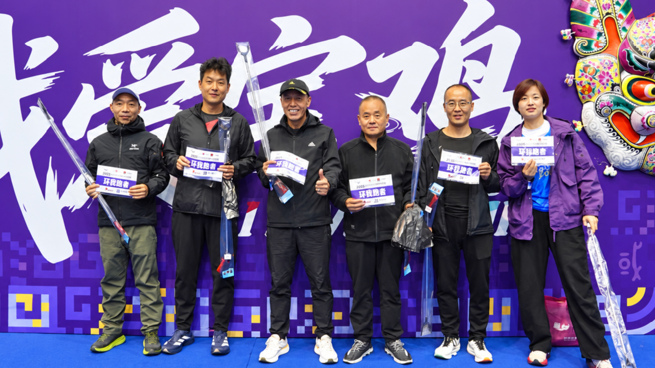 A green running team at the 2026 Baoji Marathon