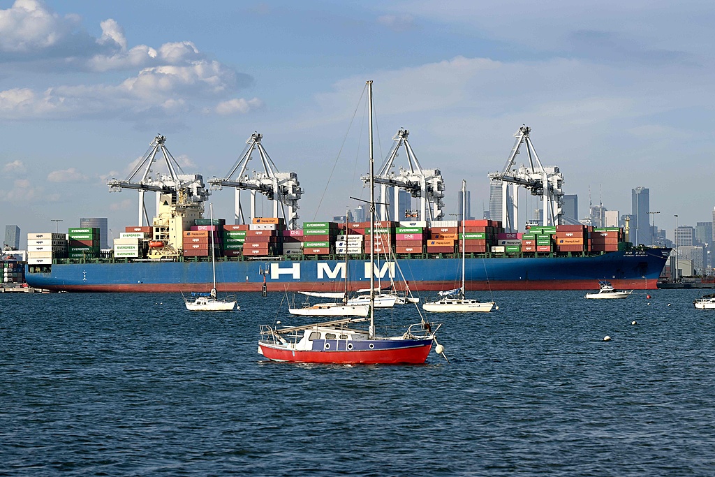 The 304-meter-long container ship Hyundai Shanghai is loaded with cargo at the Port of Melbourne, Australia's largest port for containerized and general cargo, on March 23, 2026.