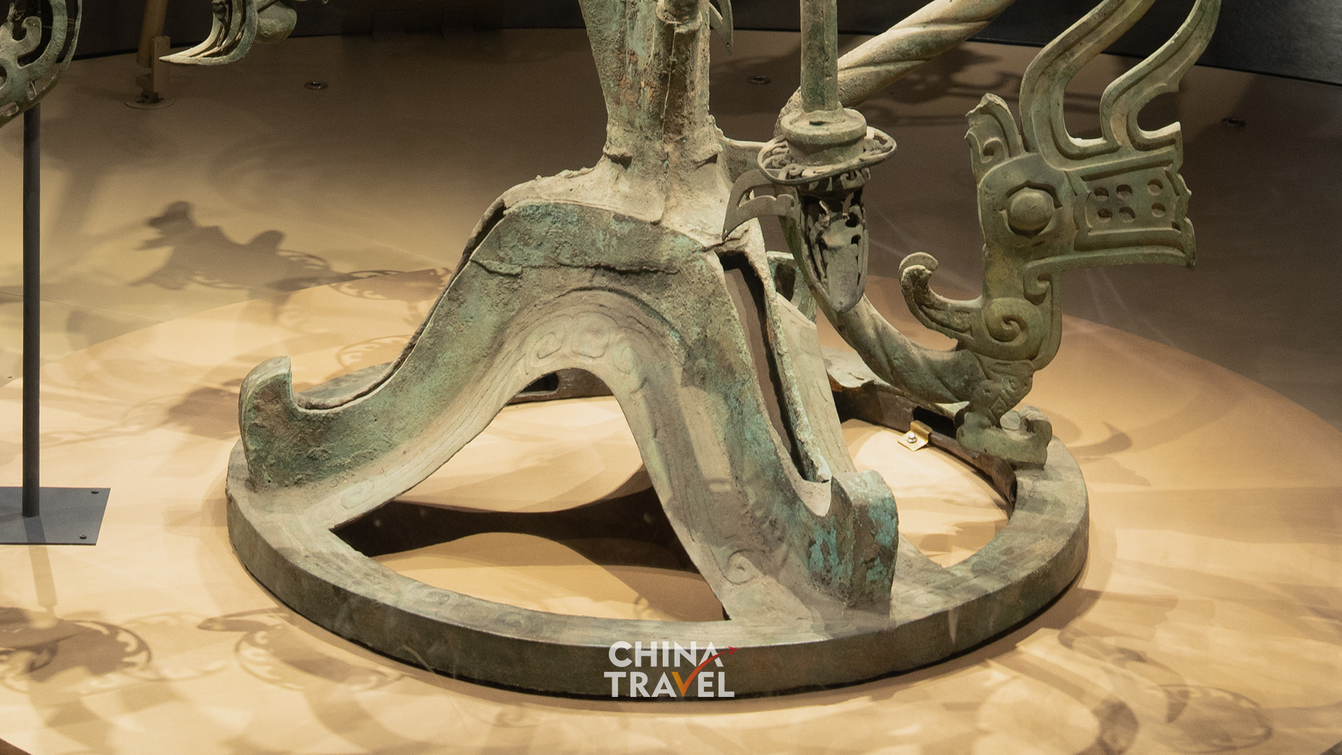 Details of the dragon, trunk and base reveal how the tree's many forms come together in bronze. /CGTN