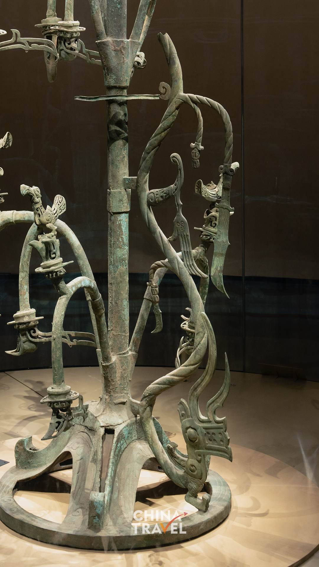 Details of the dragon, trunk and base reveal how the tree's many forms come together in bronze. /CGTN