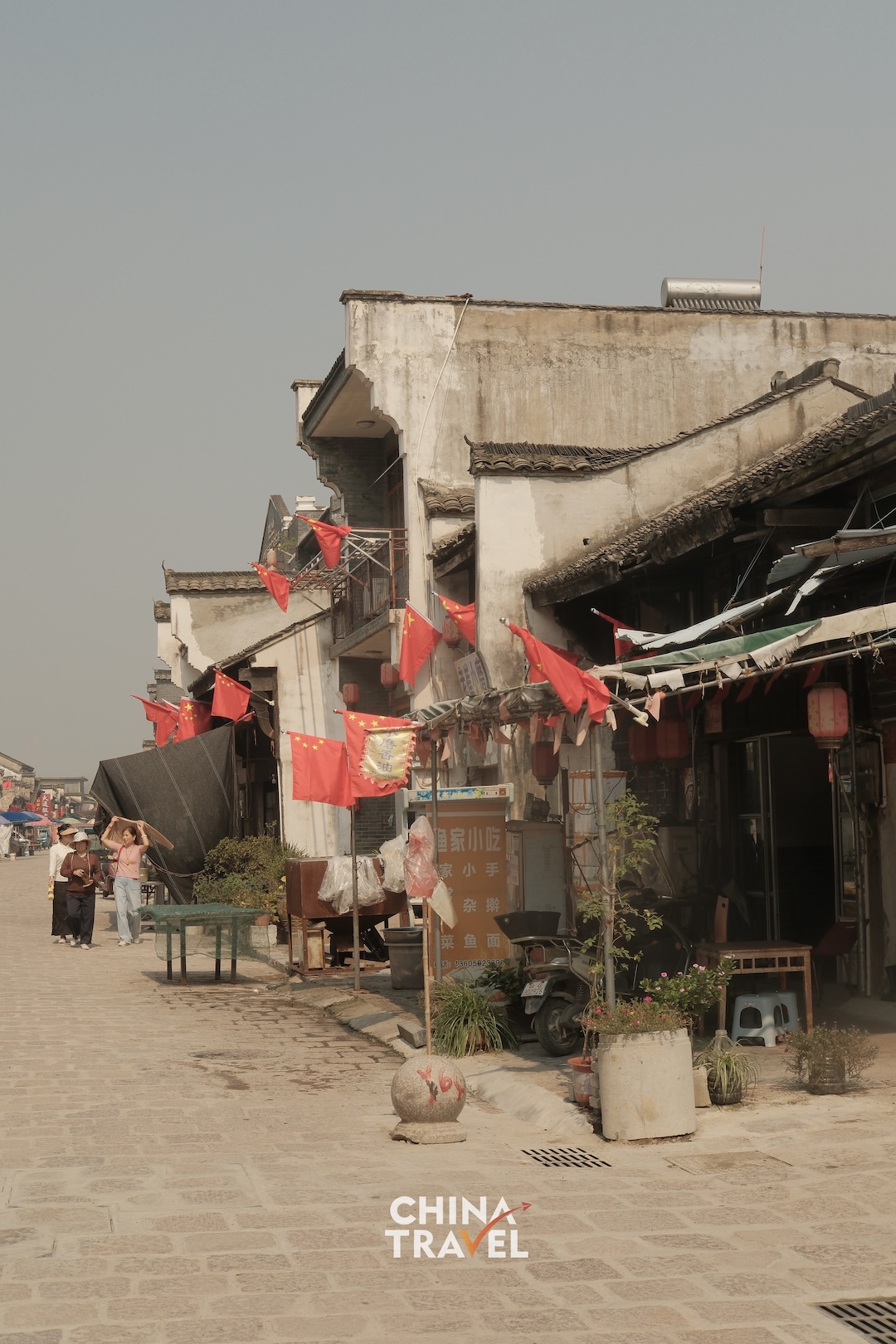 Weathered facades, tiled roofs and small storefronts give Datong's old streets their distinctive character. /CGTN