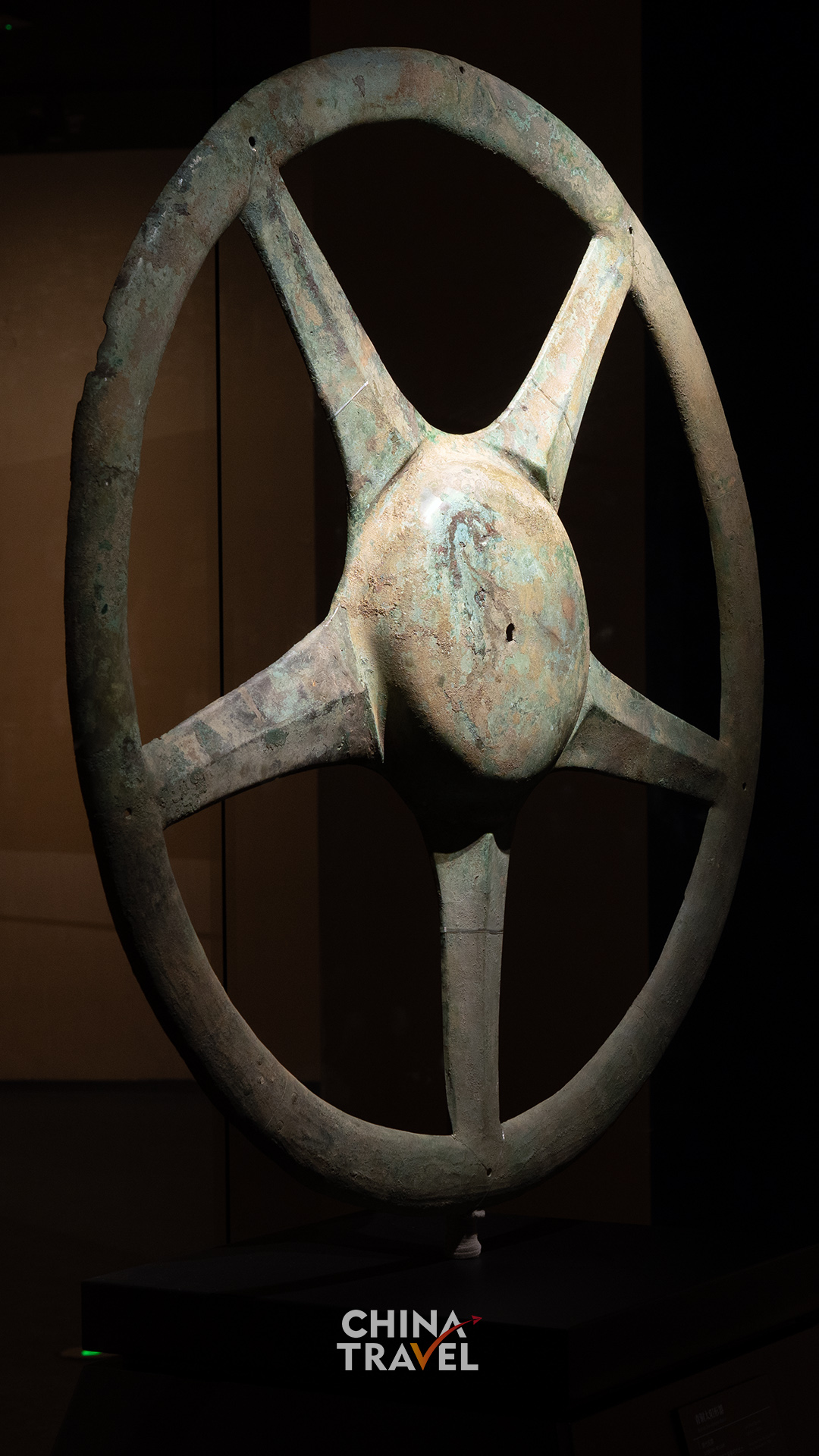 Front and rear views reveal the circular outline and radiating structure of Sanxingdui's sun-shaped bronze. /CGTN