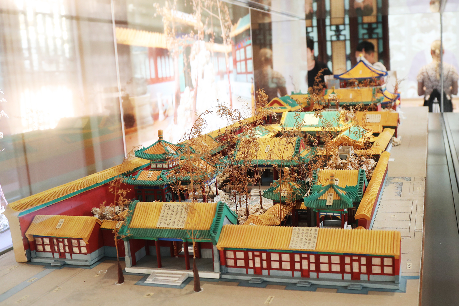 A view of the re-created ironed paper models of the Qianlong Garden on display at the Palace Museum in Beijing. /CGTN
