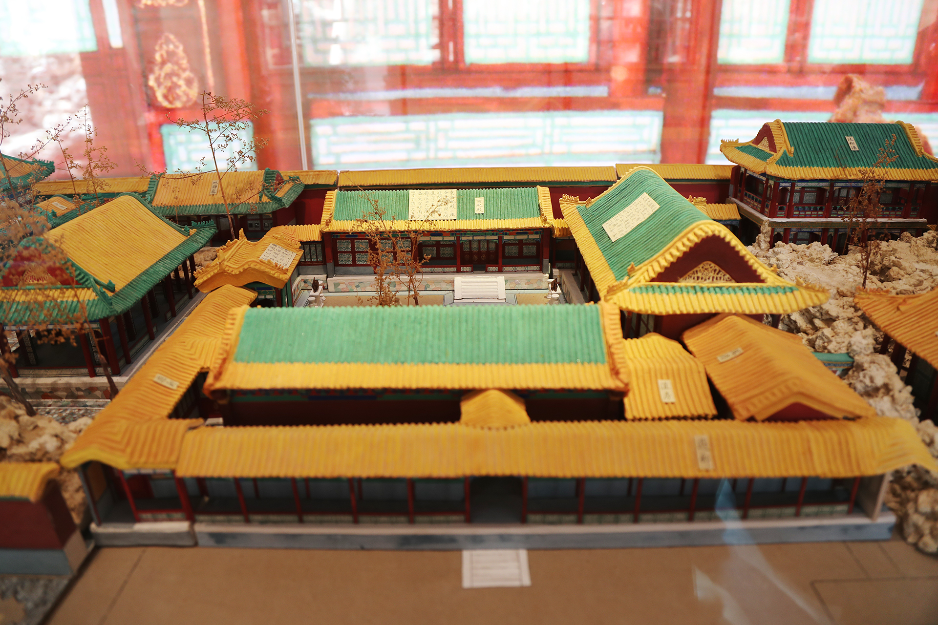 A view of the re-created ironed paper models of the Qianlong Garden on display at the Palace Museum in Beijing. /CGTN