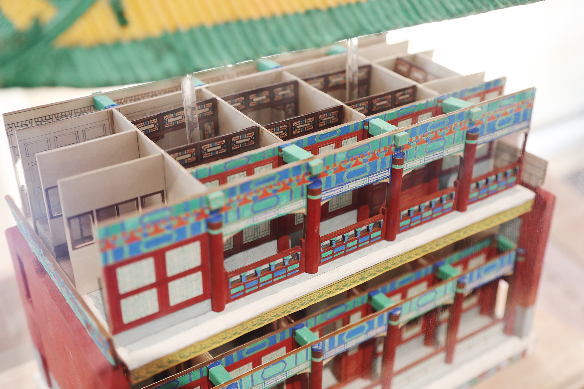 A re-created ironed paper model of the Building for Enjoying Lush Scenery in the Qianlong Garden is on display at the Palace Museum in Beijing. /CGTN