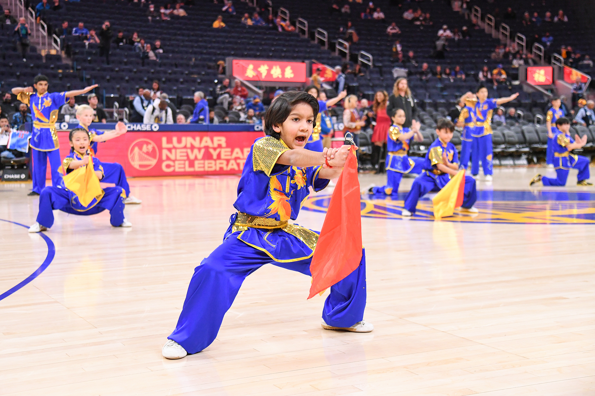 Young performers showcase martial arts to celebrate the Chinese New Year during an NBA regular-season game in San Francisco, California, January 22, 2023. /CFP