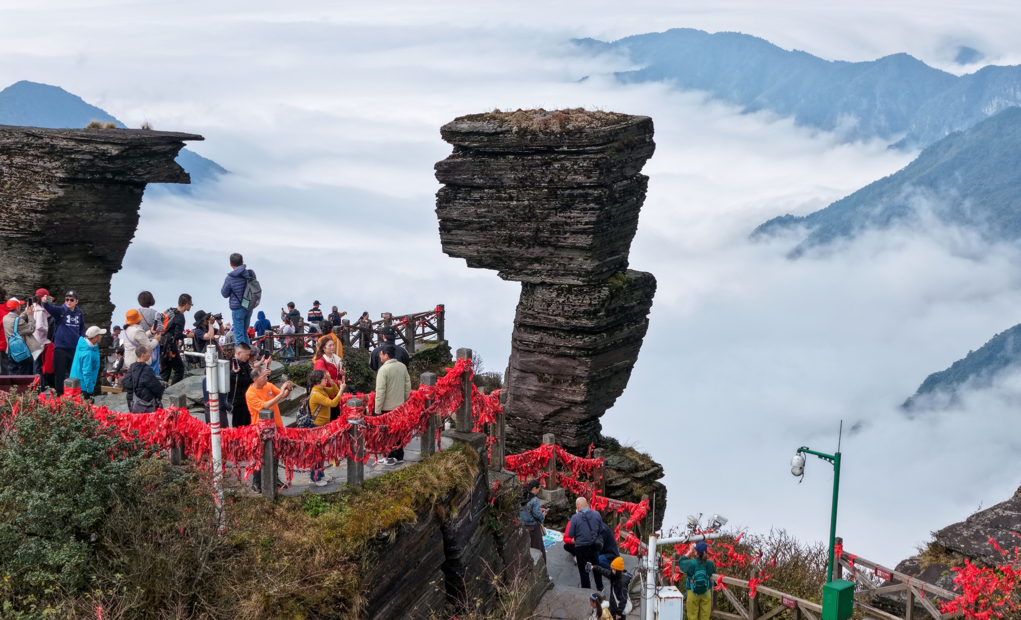 A view of Mount Fanjing wrapped by clouds is seen in Tongren, southwest China's Guizhou Province on October 24, 2026. /Tongren Media Convergence Center