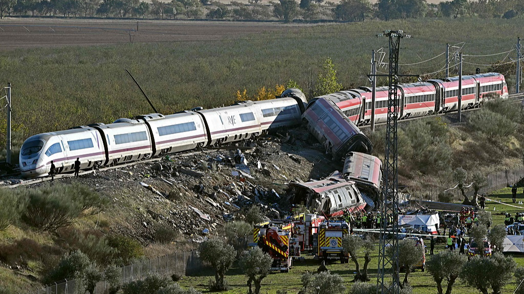 Live: Latest on emergency services work after high-speed train collision in Spain