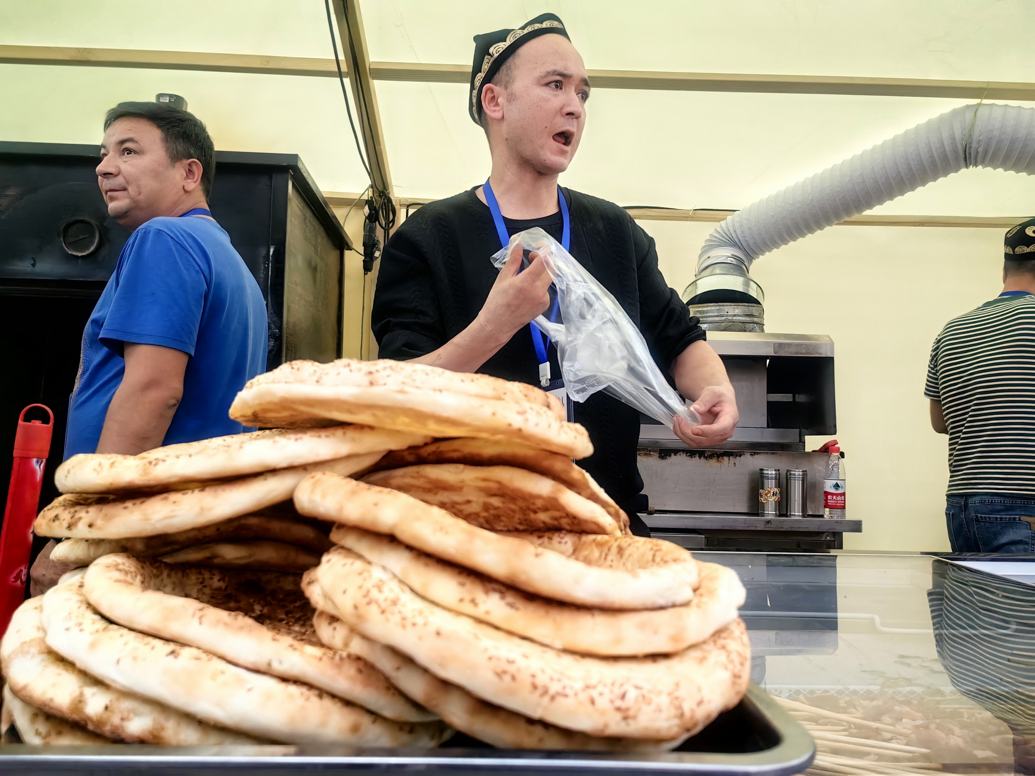 Naan bread from Xinjiang is seen during the 2026 Shanghai-Xinjiang Cultural Exchange Week event in Zhoupu Town, Shanghai on October 29, 2026. /VCG