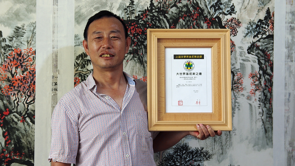 Chinese artist breaks domestic record with longest calligraphy scroll ...