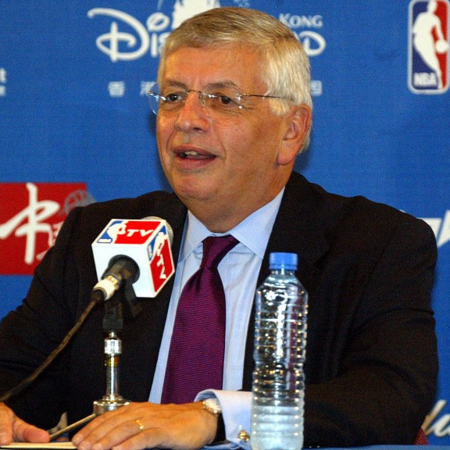 NBA Commissioner David Stern, center holding the ball, poses for a