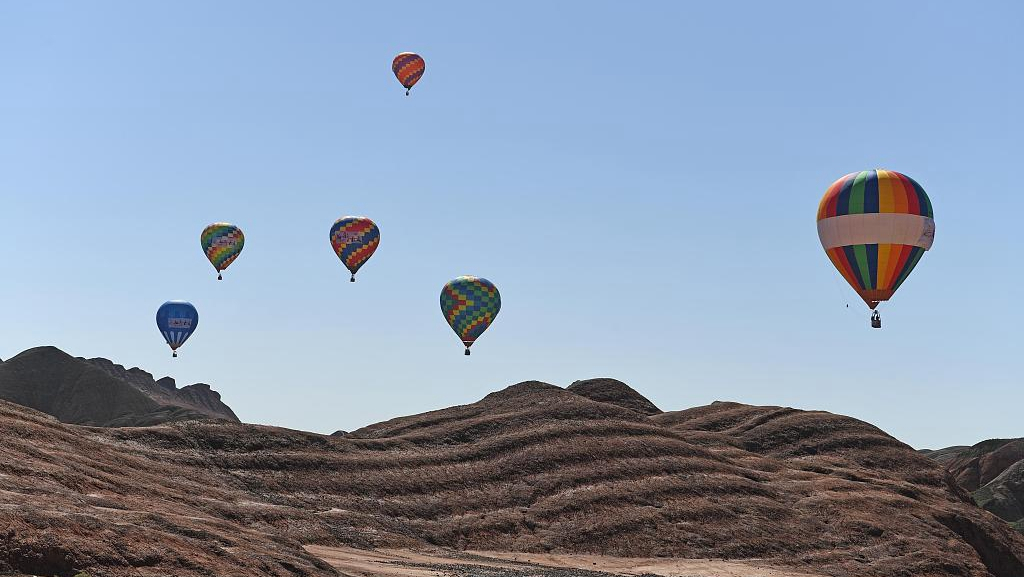 Zhangye Danxia Geopark holds first hot air balloon festival - CGTN