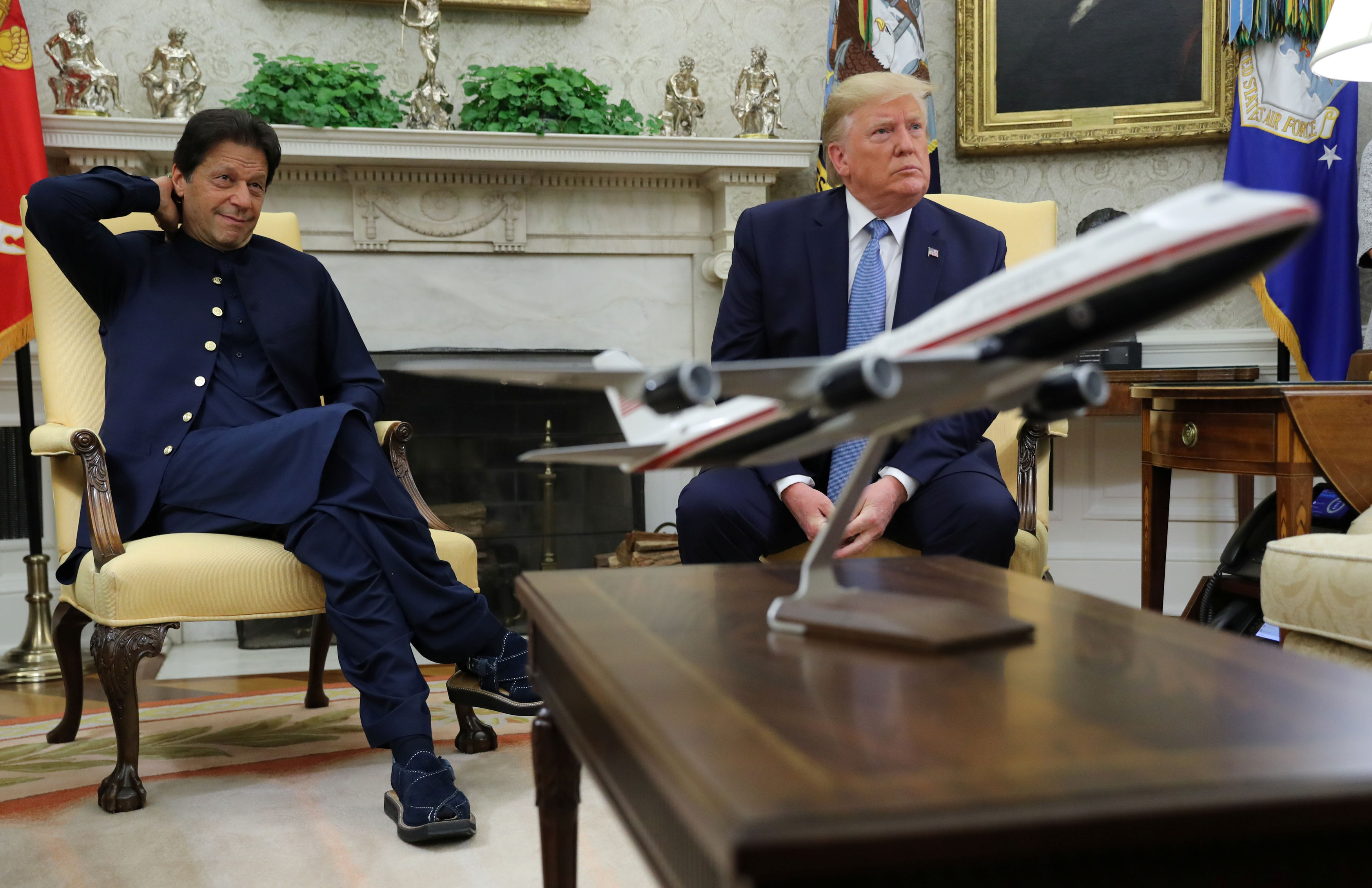 U.S. President Donald Trump and Pakistan's Prime Minister Imran Khan take questions from reporters in the Oval Office at the White House in Washington, U.S., July 22, 2019. /Reuters Photo