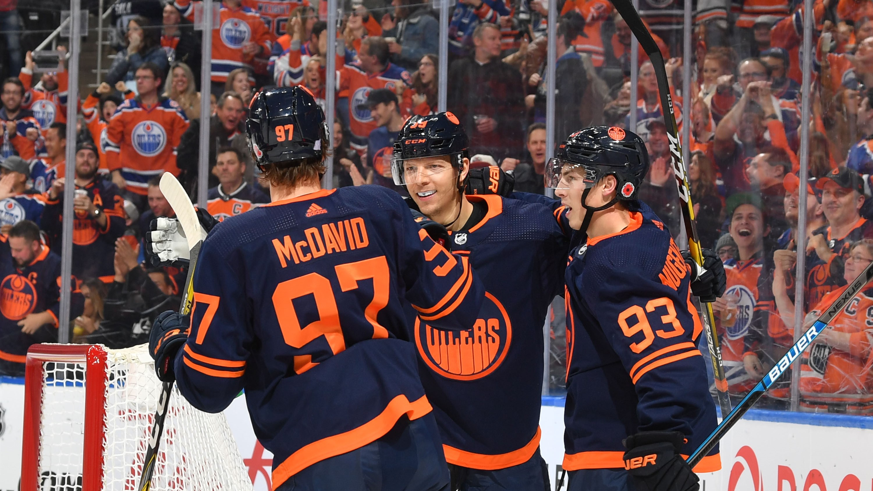 Players of the Edmonton Oilers celebrate in the game against the New Jersey Devils at Rog...