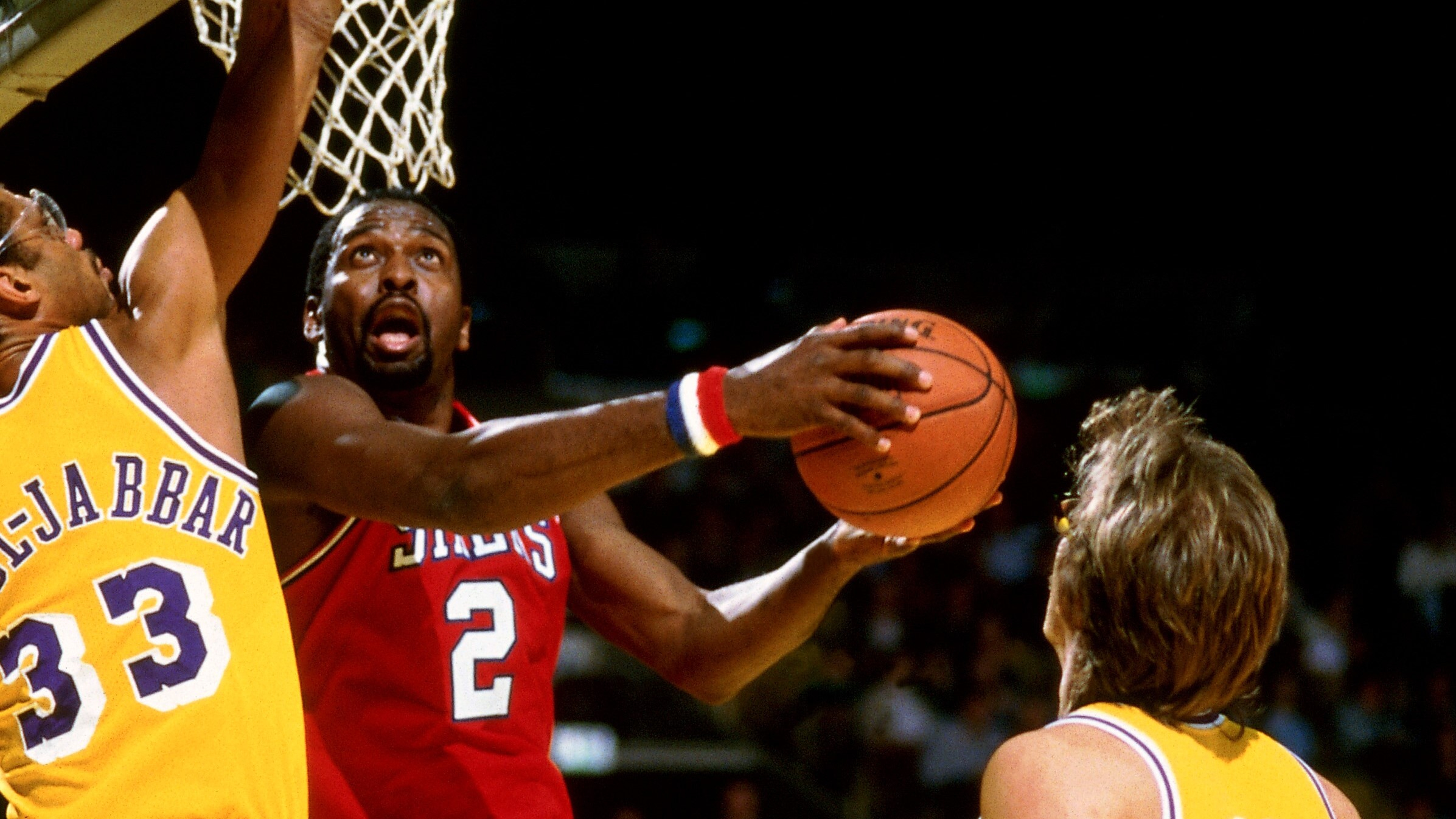 Philadelphia 76ers Moses Malone in action, making dunk vs Los
