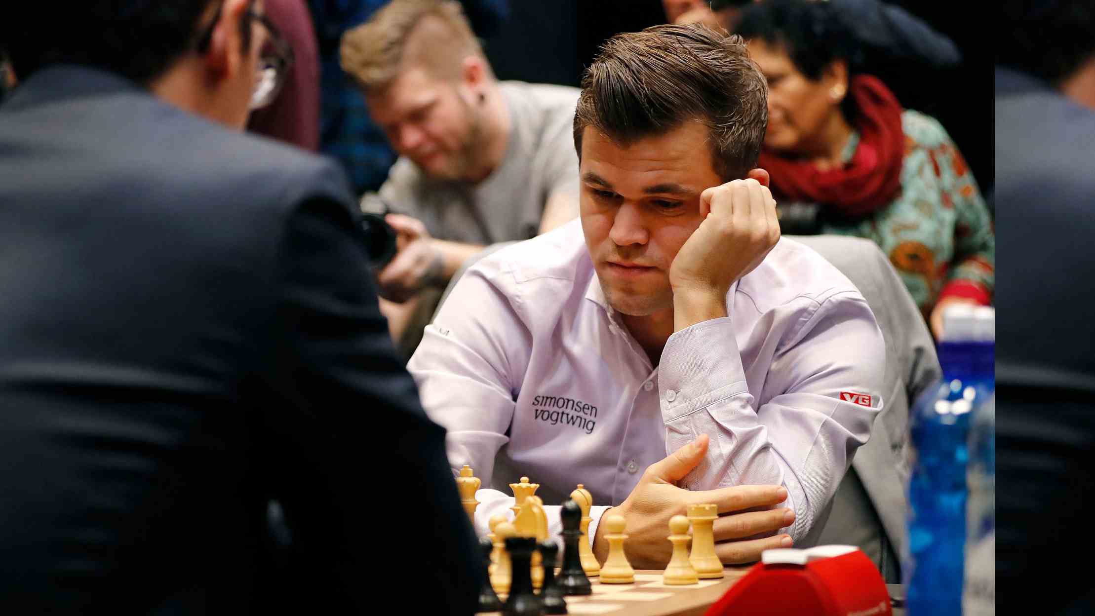 World Chess Championship 2018: Carlsen defends his crown in rapid tie-breaks