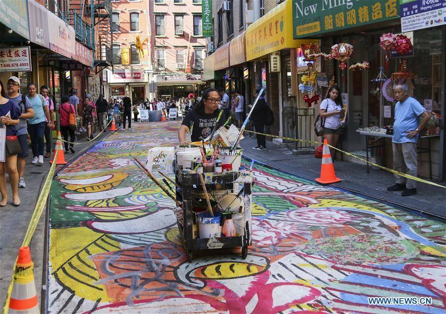 Giant mural of dragon painted in NYC's Chinatown - CGTN