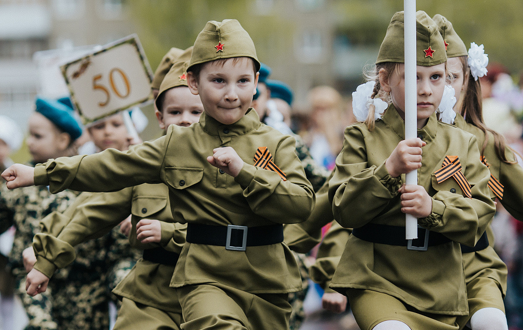 In victory we trust Russian children march in military uniforms CGTN