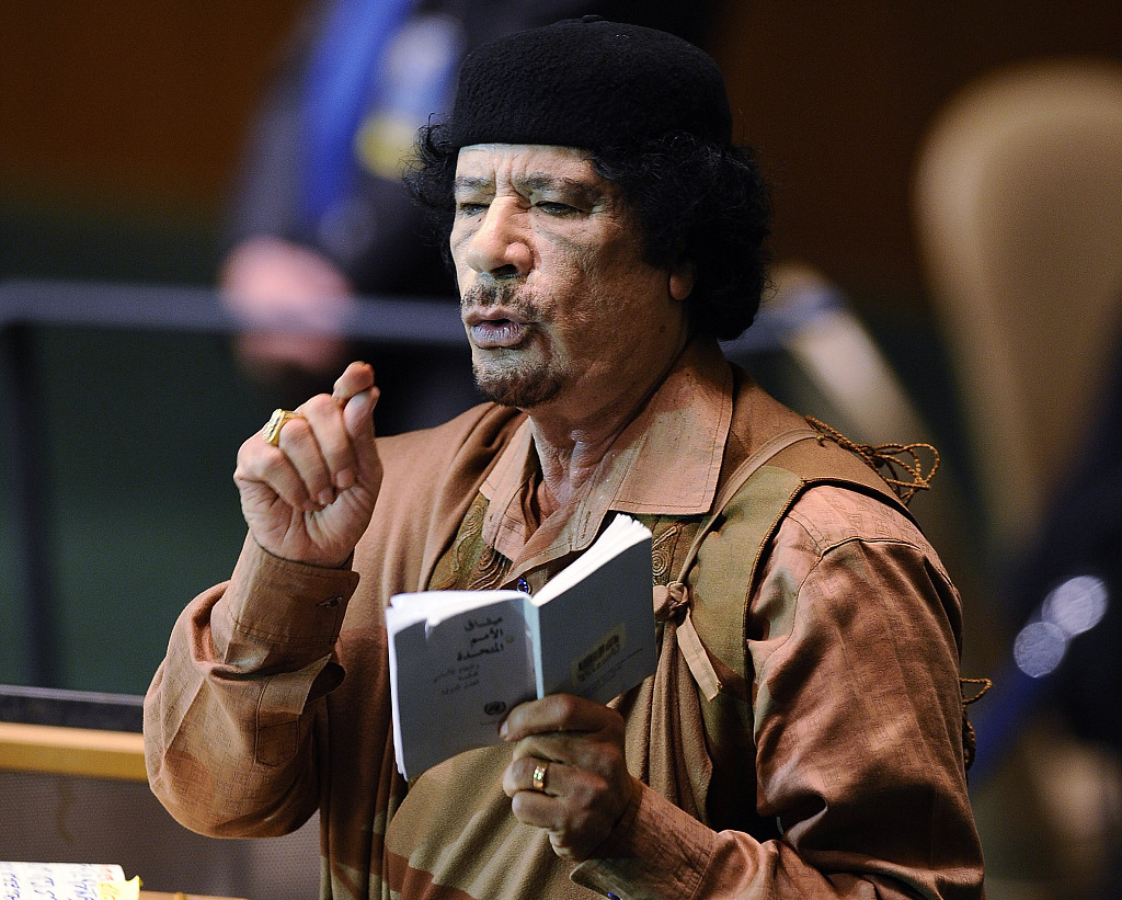 Former Libyan leader Moammar Gadhafi speaks at the 64th General Assembly in...